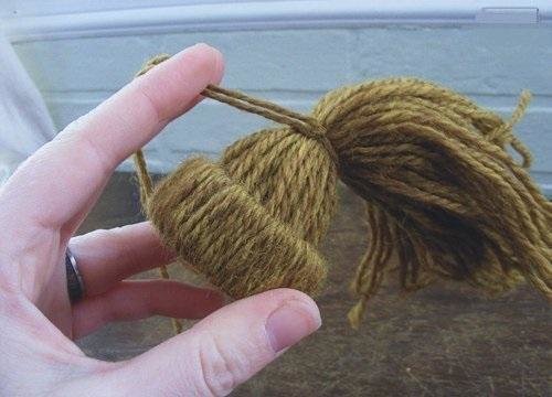 cap of thread and cardboard